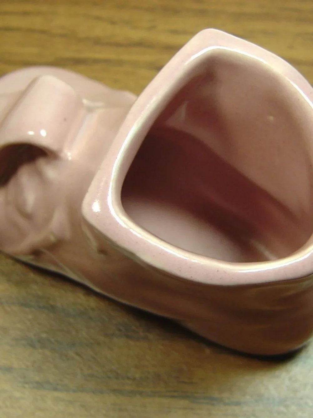Vintage pink baby shoe planter/vase